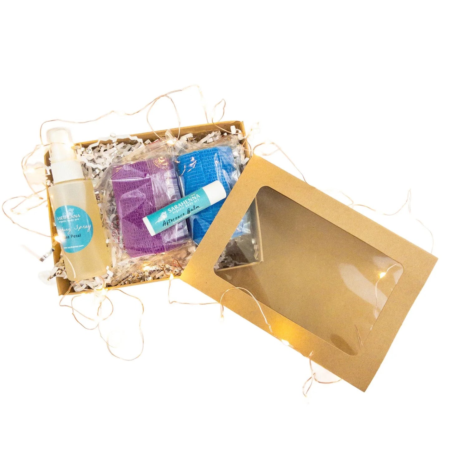 A box with a variety of different aftercare products for henna designs