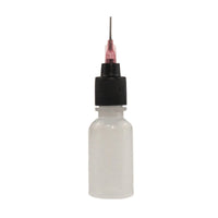 An empty henna applicator bottle
