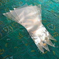 A plastic bag used for filling henna applicators