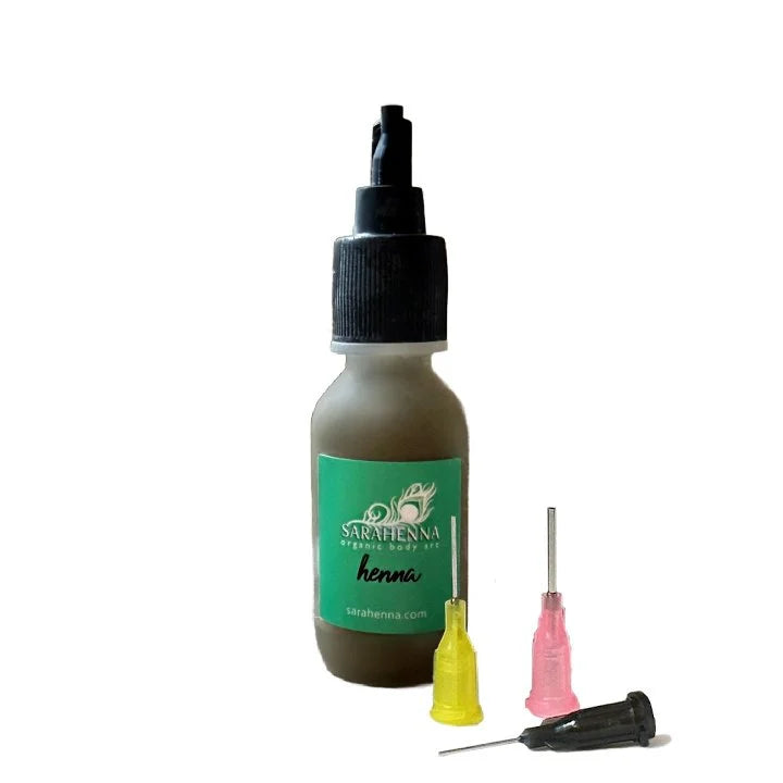 A bottle of fresh henna paste