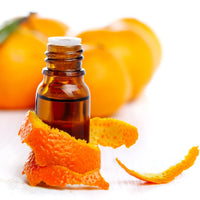 A glass bottle of sweet orange essential oil