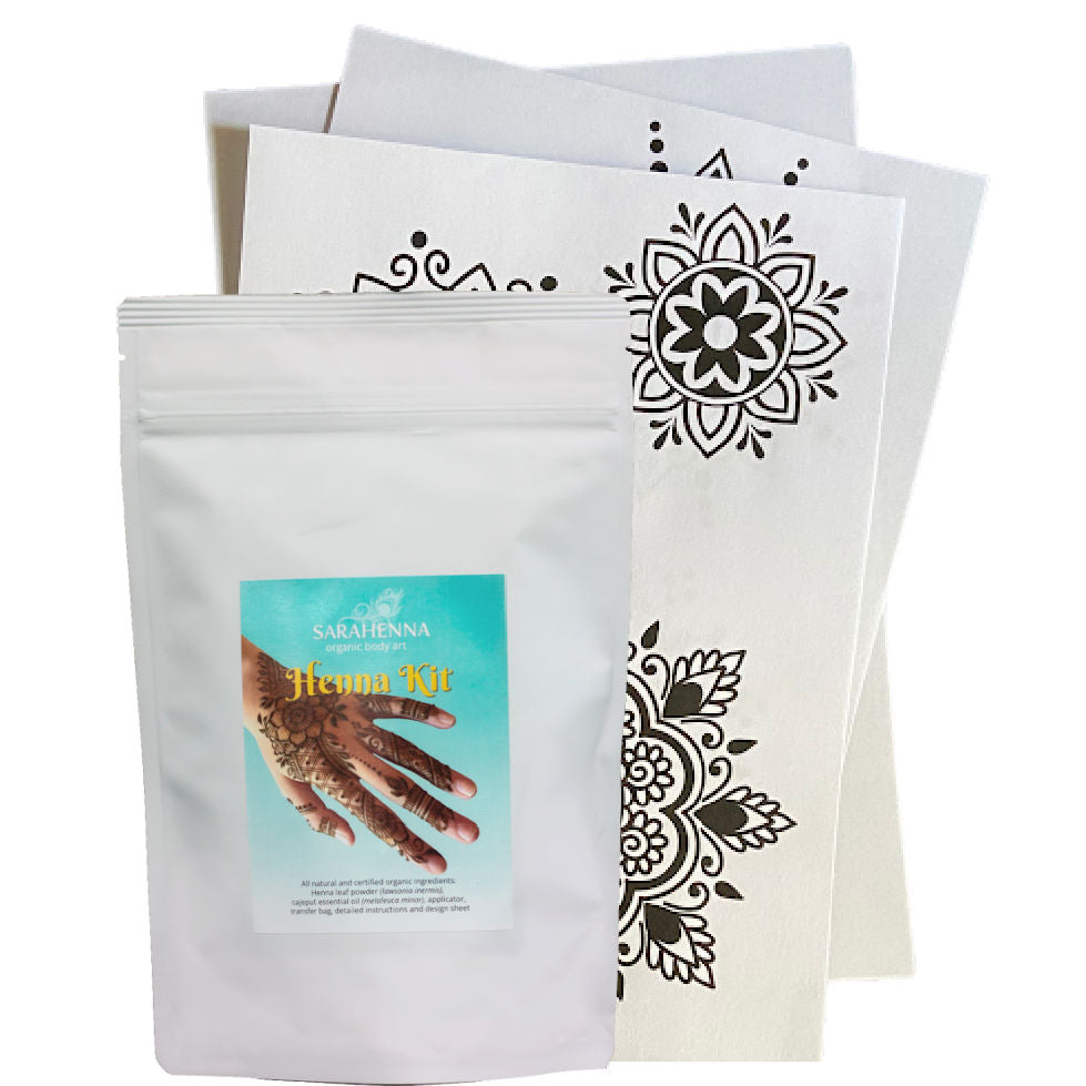 Henna kit with a white pouch and stencils on a white background