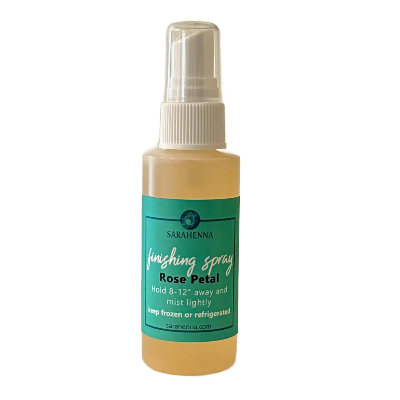 A bottle of handmade finishing spray for henna designs
