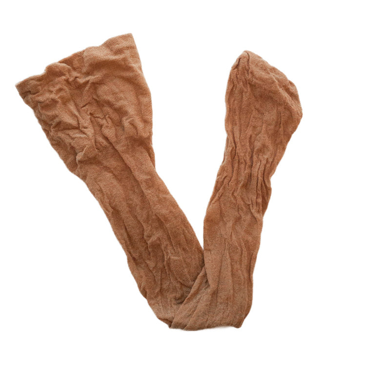 A nylon bag used for straining fresh henna paste